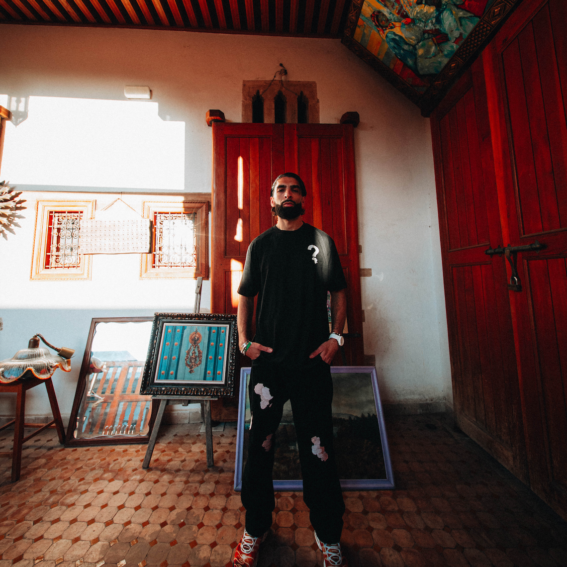 AFRICA'S MOST WANTED TEE BLACK