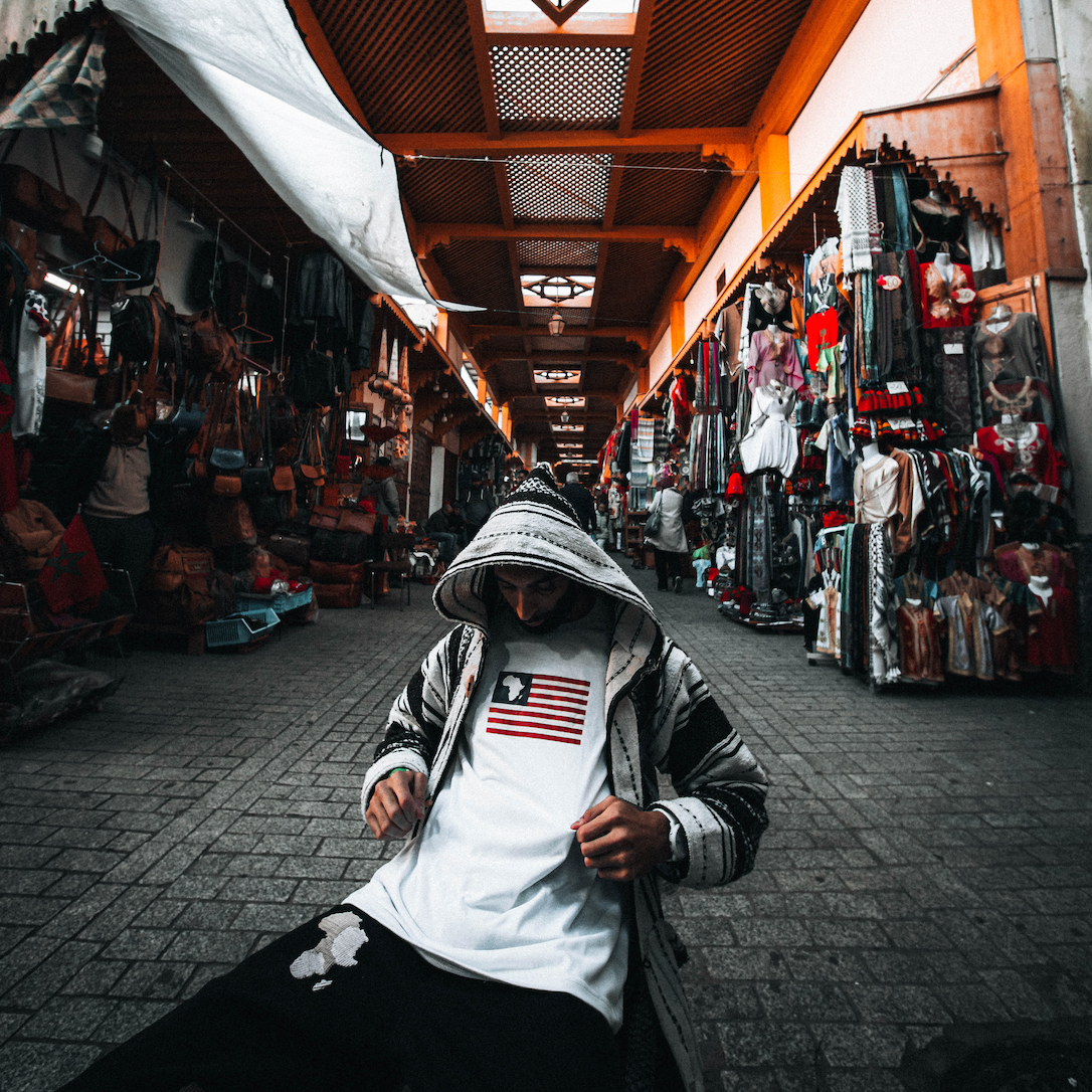 AFRICA'S MOST WANTED TEE WHITE